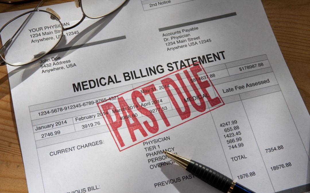 PAST DUE stamped in red on a medical invoice to illustrate the topic of unsecured medical loans
