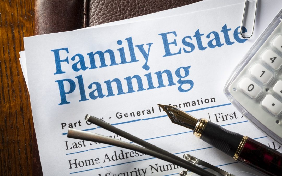 Estate Planning with pen, glasses, and caculator to illustrate long term care trust